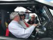 Derek Bell (za volantem Sinu R1) a Jon Mirachi na floridském okruhu Palm Beach