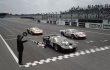 Rekonstrukce triumfálního průjezdu cílem v roce 2006 podle roku 1966 (tehdy první Amon/McLaren před dvojicemi K.Miles/Hulme a Bucknum/Hutcherson)