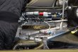 Štítek Powered by PRAGA na motoru Judd HK (upravený BMW M3) u Lotusu...